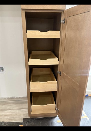 Small details, big functionality ✨ Pull-out trays that make everyday living easier. ✨Clear Vision Remodeling✨ 📱 213 884-8896 #kitchenremodeling#pullouttrays#pulloutcabinets#kitchenideas