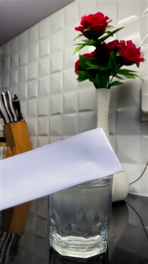 🔥 Invisible fire! 😱✨ I took a glass filled with water, added a few pumps of hand sanitizer, and lit it up with a match. At first, it looked like nothing was happening — the water seemed calm. But when I brought a piece of paper close… BOOM, it caught fire instantly! 🔥🤯 So what’s really happening here? 🧪 Hand sanitizers usually contain alcohol (ethanol or isopropyl alcohol), which is highly flammable. When you pour it on water and light it, the alcohol burns with a blue, almost invisible fla