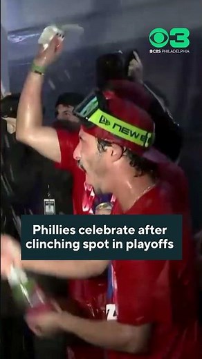 Phillies celebration in clubhouse after clinching spot in playoffs