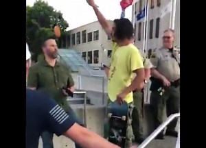 Washington Protester Dangles Donut in Front of Officer, Gets Shoved, Arrested for Assault [VIDEO]