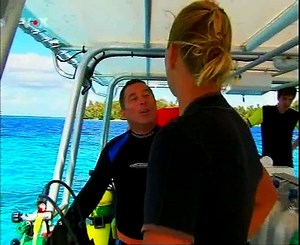 Couple diver underwater tour