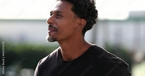 Happy black African man smiling and laughing