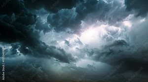 A very dark sky with ominous storm clouds gathering on the horizon, An ominous storm cloud gathering on the horizon