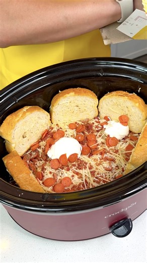 Easy crockpot dish I make a cheesy pizza crockpot dip in my slow cooker with pepperoni, cream cheese, tomato sauce, and parmesan. | Amy's Kitchen