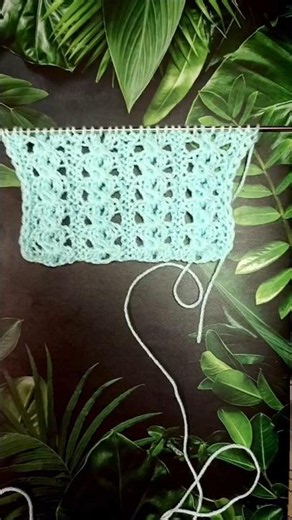 A gorgeous lace knitting pattern with vertical chain-like stripes #knittingtutorial #knitting