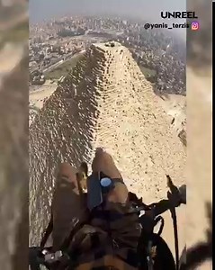Paramotor flying super close to the pyramids of Giza! 😮 What is written on top of the pyramid? . 🎥 @yanis_terzis IG | UNREEL