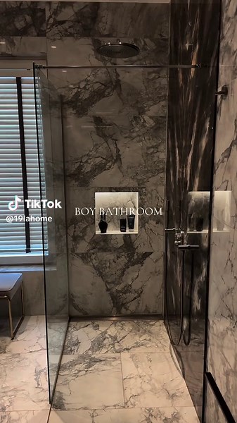 Modern Masculine Bathroom Design with Wood and Dark Marble