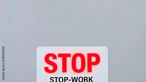 Hand holding stop sign safety prevention authority card stop work sign hand safety card authority prevention notice warning for workplace hazard