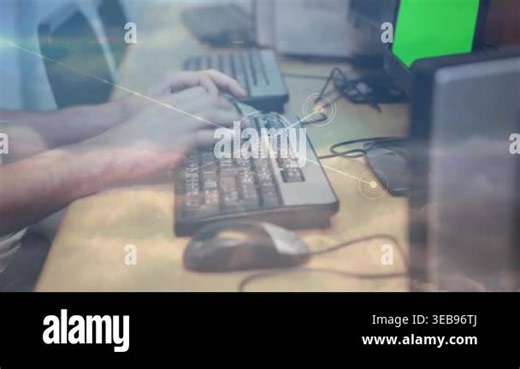 Network of connections against mid section of a person using computer at office. global networking and business technology concept Stock Video Footage - Alamy