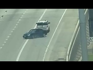 Houston SUV tows car backwards