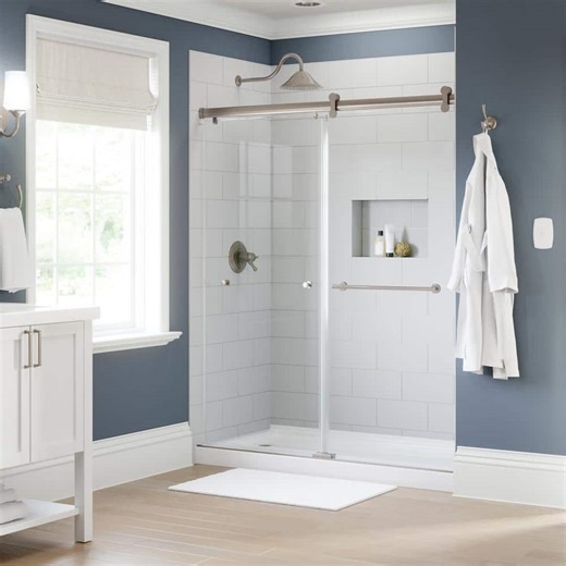 Check The Home Depot's Q&A Before Buying: Delta LuxeTrack Greydon 52 to 60 in. W x 72-1/2 in. H Frameless Sliding Shower Door in Nickel with 1/4 in. Clear Glass
