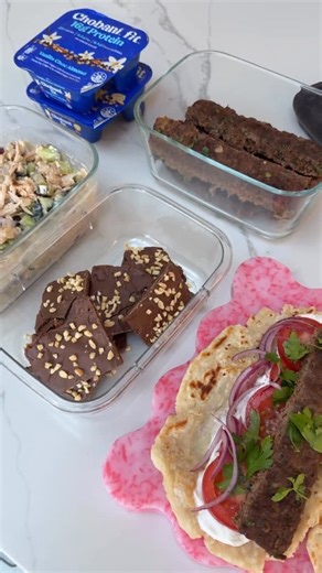 Miranda Brady on Instagram: "Easy & delicious meal prep to help keep you on track with your goals 👩🏼‍🍳✨ On the menu this week ⬇️ - Hot honey chicken feta salad - Sheet pan kebabs with homemade flatbread - Ferrero Rocher date bark - New Chobani Fit Flips with 16g of natural protein Full recipes pinned in the comments 🫶🏻 #paidpartnership #ad"