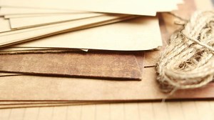 Download stack of Old papers on table for free