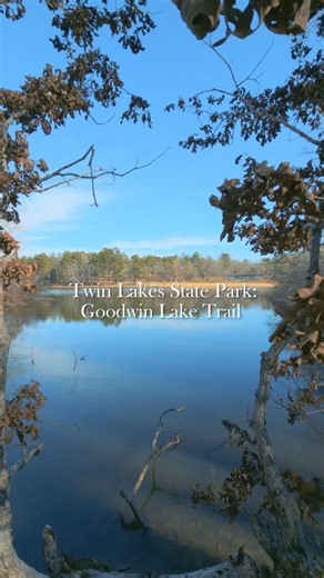 Twin Lakes State Park's Goodwin Lake Trail is an easy rated, 1.1-mile trail loop that is perfect for all ages. This scenic trail is ideal for hikers looking to make the most of their visit in a short time. Along the way, you’ll enjoy views of the beachfront swimming area, wooded paths with multiple bridge crossings, and convenient access to the fishing pier, boat launch, picnic areas, gift shop, and seasonal concession stand. | Virginia State Parks