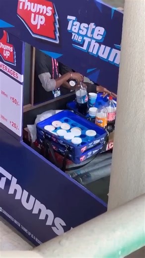 Taaza TV on Instagram: "A viral video from Arun Jaitley Stadium during the 2026 T20 World Cup shows staff pouring leftover drinks from used cups into bottles. This video has raised hygiene concerns since it's unhygienic, but it's unclear if for resale or waste disposal. No official statements has been issued from ICC, BCCI, or Coca-Cola yet. [ Arun Jaitley Stadium, Delhi, T20 World Cup, Leftover drinks, Hygiene concern, ICC, BCCI, Coca Cola, Viral Video ] #arunjaitleystadium #delhi #leftoverdrin
