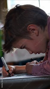 Concentrated child doing school homework