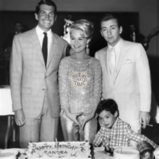"Circa 1966, Sandra Dee and her husband, singer Bobby Darin, were photographed in California celebrating her 22nd birthday alongside their young son, Dodd Darin. The occasion captured a moment of warmth and togetherness, reflecting the couple’s charm and popularity during the height of their careers." | History Through Time