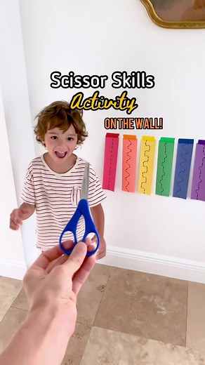This scissor skills activity is easy peasy to set-up, but such a great opportunity for kid’s to strengthen fine motor skills! ✂️ Plus, taping it up vertically is a fun way to mix things up and get kiddos on their feet. 🙌 Save this video so you remember to make it too, and check back daily for more fun ideas for kids and families! 💕 - #kidsactivities #scissorskills #prekactivies #prewritingskills #finemotorskills @7daysofmichelle