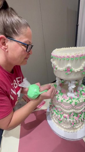 This was our largest wedding cake order to date! Super cool. 90 Swan cream puffs and 120 cupcakes and a huge wedding cake! Weddings are super fun to do! | MandyCakes Bakery & Bistro