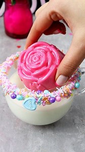 Rose white chocolate cocoa bomb! Tools linked to my amazon storefront-link in bio and comments #cocoabombs #valentinestreats #chocolatecoveredtreats #hotchocolatedrink #treatmaker | Loveisbakeable