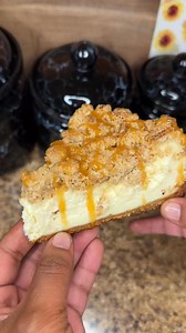 Apple Crumble Cheesecake Graham Cracker Crust 15 Graham Crackers 5 Tablespoons of Butter - Melted 3 Tablespoons of LB Sugar 1/4 Teaspoon of Kosher Salt Shape crust in the springform pan. Cook for 8 minutes on 350. Remove and let it cool. Cheesecake Filling 1 Cup of Sugar 2 Tablespoons of Cornstarch Pinch of Salt 3 8oz Packs of SOFTENED CREAM CHEESE 1 Cup of Sour Cream 3 Large Eggs 1 Egg YOLK - mix in 1 by 1. 2 Teaspoons of Vanilla Extract Crumble Topping 1 and 1/2 Cup of AP Flour 1/2 Cup of Brow