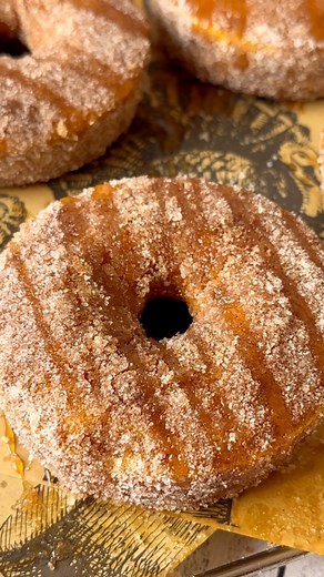 Theresa Marie Krunev on Instagram: "Cinnamon Sugar Pumpkin Donuts 🍩🎃 OH MY GOURD, these Pumpkin donuts are so moist, coated in cinnamon sugar and drizzled with caramel! If you don’t have a donut pan use a muffin or a loaf pan. Full recipe below. Pumpkin Batter: * 2 cups flour * 1 1/2 cup sugar * 2 tsp pumpkin pie spice * 2 tsp baking powder * 1/4 tsp salt * 2 cups pumpkin puree * 3 eggs * 2 tsp vanilla extract * 1/2 cup, unsalted butter, melted * 2 tbsp vegetable oil * 3/4 cup chocolate chips,
