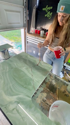 Who said you can't have luxury countertops in an RV?? I was dreaming of creating these Onyx countertops with thick copper veining to enhance the beautiful kitchen sink and @zcounterform did not disappoint!!I am so in love with the touch of green these have brought into the trailer not to mention they are SUPER lightweight and so affordable!!!I promise you cannot mess these up as epoxy is super forgiving, just be sure to prep so you don't have a mess to clean up after!!😉😆Would you ever give thi