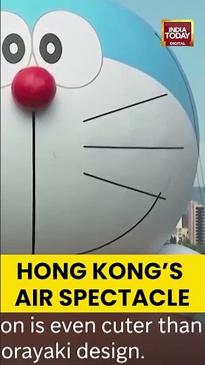Giant inflatable cartoon characters float over Hong Kong’s Victoria Harbor in a stunning art display