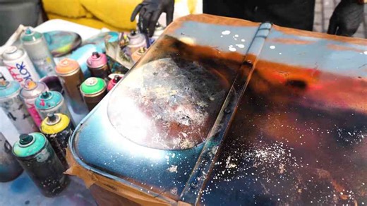 I turned a leather briefcase into a spray art masterpiece
