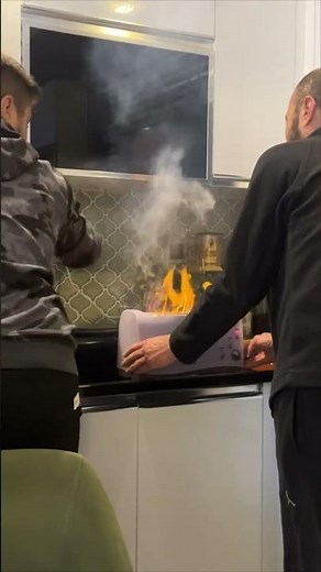 Kitchen Toaster Catches Fire, Man Quickly Smothers Flames