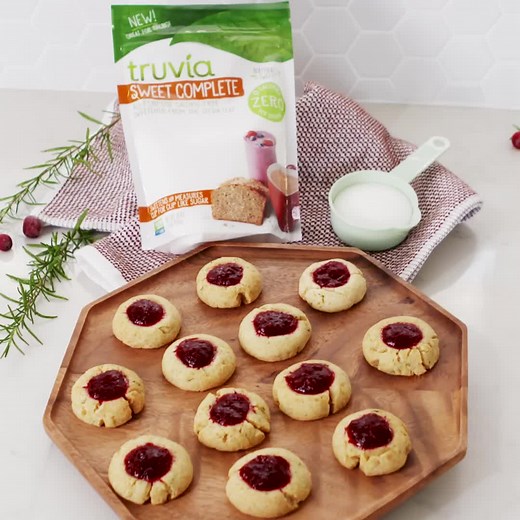 3.3M views · 1.6K reactions | These reduced sugar Cranberry Thumbprint Cookies taste as good as they look, and are perfect for entertaining this season! | Delish | Facebook