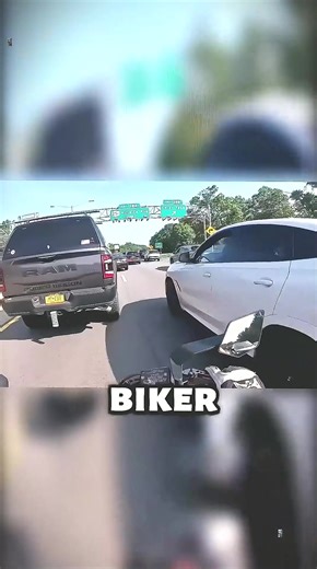 Hilarious Dashcam Moment: Biker Tickles Feet Out the Window