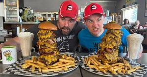 American pro eater Randy Santel and Czech competitive eater “Steel Rod” Radim Dvoracek from Ostrava, Czech Republic are at Area 52 Diner - Owosso, MI in Owosso, Michigan, each taking on their 20-Layer “Forbidden” Burger Challenge!! We each have just 30 minutes to feast on a 20-layer bacon cheeseburger served with 1lb of fries and a large flavored milkshake. I’m going for overall food challenge victory #1255 and we are each trying to win our $39.99 burger meals free plus sweet T-shirts and spots 