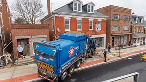 Garbage truck slams into apartments and a business in Spring Grove