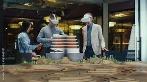 Male architect uses VR headset and wireless controllers, presents modern hi-tech building and park architectural project in virtual reality to colleagues. 3D hologram. Future digital AI technologies.