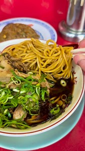 Kyoto’s oldest ramen shop...⬇️ Born as a tiny street stall 87 years ago — now a legend. Jet-black soy sauce broth, rich pork & chicken flavor, Kyoto green onions, and their famous black fried rice. From war-time ramen stall to a nationwide icon — this is ramen history in a bowl. 🍜 Would you try it? 📍Kyoto... ✨ Traveling to Japan soon?(Private tour🇯🇵) Join my private tours and discover hidden food spots, local culture, and real stories you won’t find on Google. DM for details or tour inquirie
