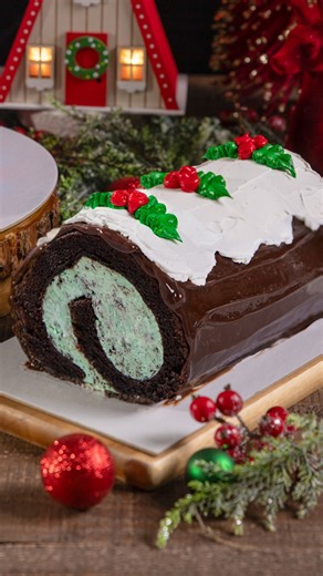 Don’t just watch… dig into the Yule Log cake before it's gone! 😍 Call your local shop to get your order in today! Tag a friend who would love this cake ⬇️ | Baskin-Robbins