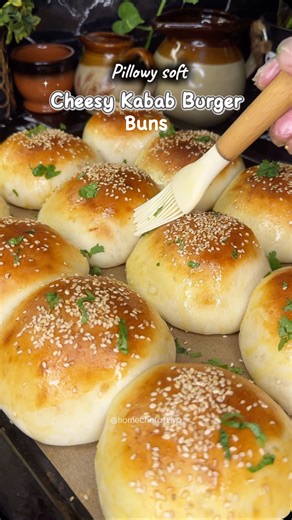 ATTIYA USMAN on Instagram: "Pillowy Soft “Cheesy Kabab Burger Buns”. Recipe 👇 Like ❤️ and Follow @homechefattiya The yummiest cheddar cheese ,cheese slices and fries used in the video are from @rohab_foods . Their cheese is sooo good. Highly recommended. INGREDIENTS Dough 1. All purpose flour 600 g 2. Instant yeast 11 g 3. Sugar 2 to 3 tbsp 4. Salt 1/2 tbsp 5. Oil 1/3 cup 6. Lukewarm water 1 and 1/3 cups Cheesy Chicken Kababs 1. Boneless chicken 1 kg 2. Onion 1 small 3. Bell pepper 1 small 4. G