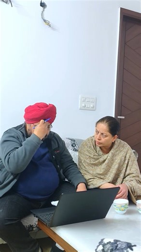 Manjeet Kaur Oberoi on Instagram: "Husband: Hmm Hmm | Wife: Problem Hai? 😆 #punjabivideo #punjabiccouple #punjabifunnycouple #funcomedy #punjabi"