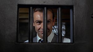 420K views · 10K reactions | Goldfinger’s Rumpus room designed by Ken Adam had angled walls to give a “bunker” feel to the set. It included an offset sphere in the form of a wagon wheel mounted on the wall and a “statement” free-standing fireplace similar to the one in Dr. No’s lair. | James Bond 007 | Facebook