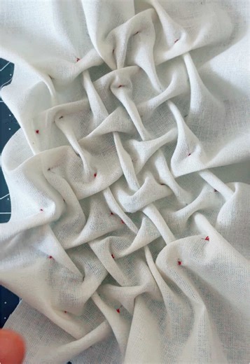 Learning lattice smoking and fabric weaving in my haute couture class. #hautecouture #hautecouturesewing #fashioninstituteoftechnology #nychautecouture #nycseamstress #thejourney #universe #lattice #latticesmocking #smocking #fabricweaving #sewingtechniques #embellishments #trims #garmentdistrictnyc #garmentdistrict #weaving #kennethking #fashiondesigner