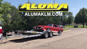 The Aluma 8218H Tilt car hauler. Stop in today and ask about Aluma trailers. https://www.cttrailers.com/ #aluminumcarhauler #tiltingcarhauler #tilttrailer #aluma | Connecticut Trailers