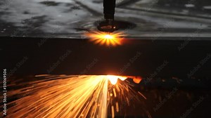 laser cutting metal sheet with sparks