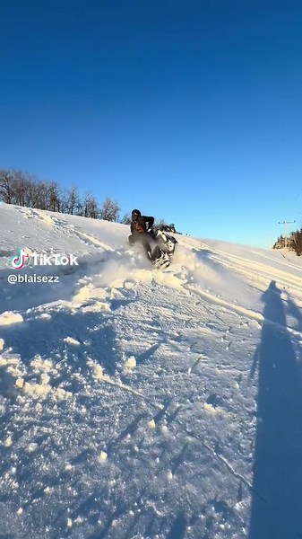 Snowmobile Stunts: Epic Wheelies and Jumps in Saskatchewan