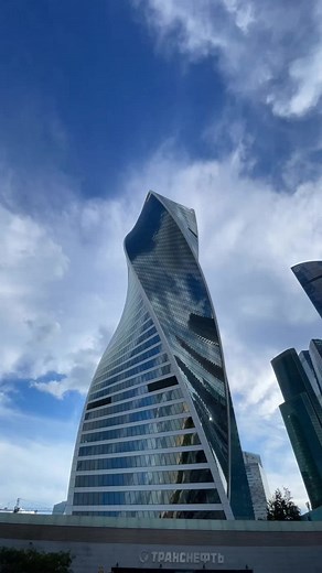 The Evolution Tower, located in Moscow's business district, stands as a symbol of architectural innovation and modernity. With its distinctive spiral design, the 255-meter skyscraper twists 90 degrees from base to top, reflecting the dynamic nature of the city. This iconic structure houses offices and commercial spaces, offering breathtaking views of the Moscow River and city skyline. Its unique form represents progress and transformation, making it a landmark in the Moscow City complex. The Evo