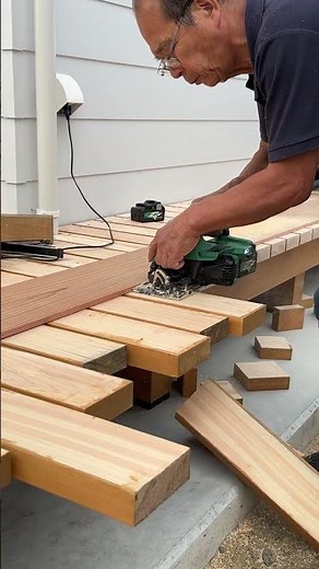 Carpenter Just Cutting Woods to Length