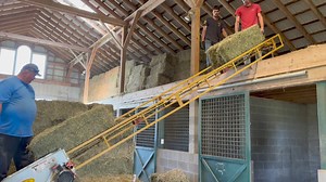 Stacking hay for Winter | Leatherwood Stud LLC.