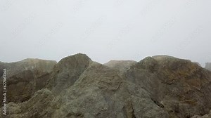 Coquille Point, Bandon Oregon Coast, Fly Over Rocks to Reveal Water and Fog