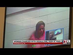 Woman charged with assaulting teen at pool