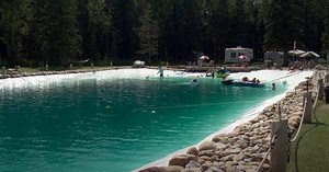 Man Builds A 300,000-Gallon Swimming Pool For His Family and It Looks Incredible